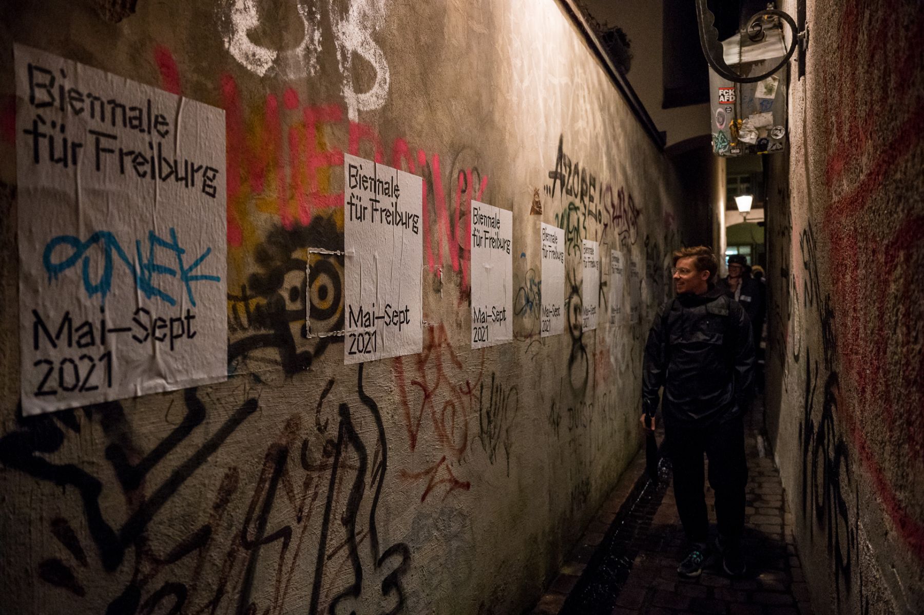 Presentation of the graphic design for BfF on the walls of the Präsenzgasse, one of the most narrow streets in Freiburg. Photography: Marc Doradzillo.